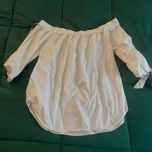 Off the shoulder shirt, sleeves that have a tie fringe, white and size M